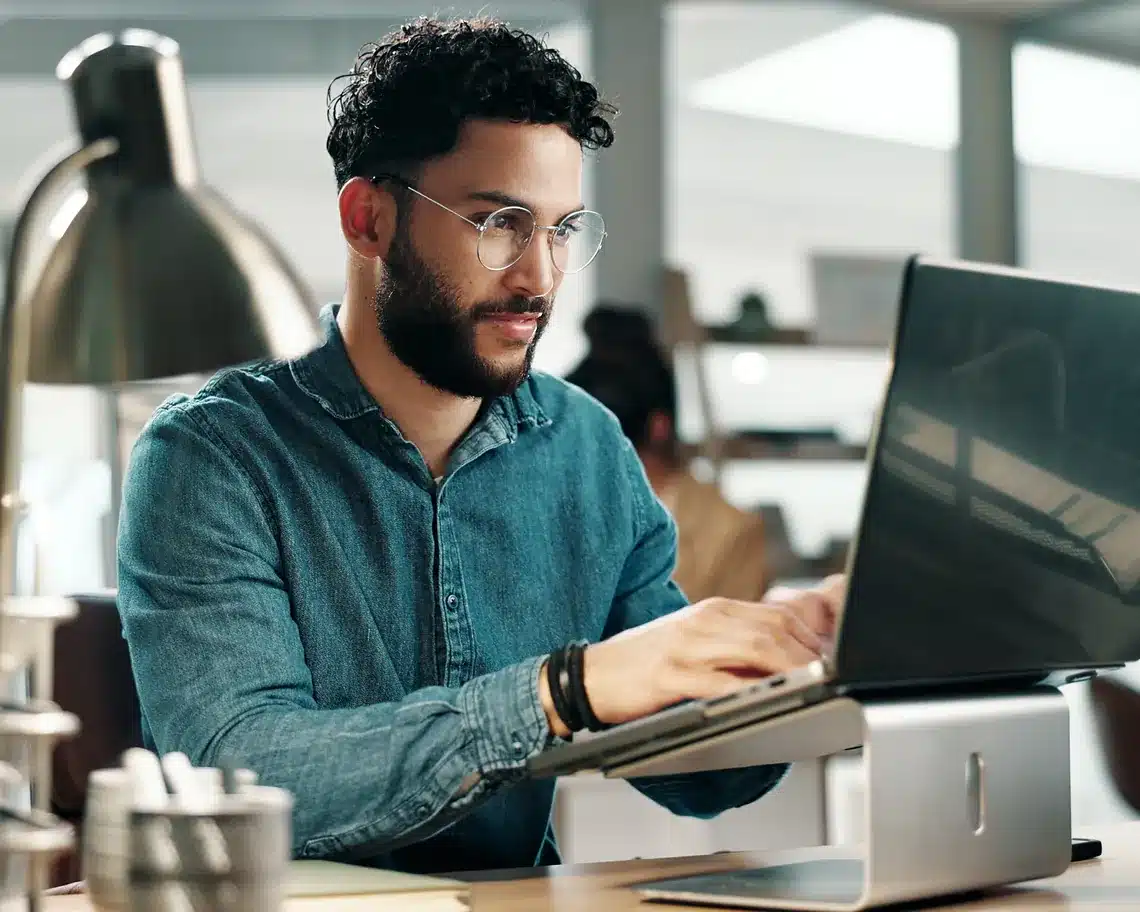 Copywriter writing newsletter laptop Copywriter writing newsletter laptop