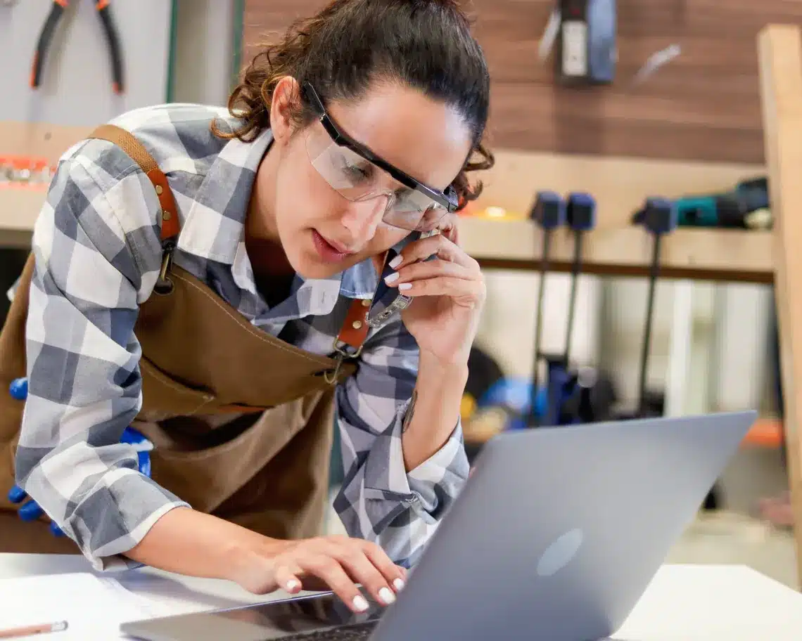 Local business owner phone laptop leads